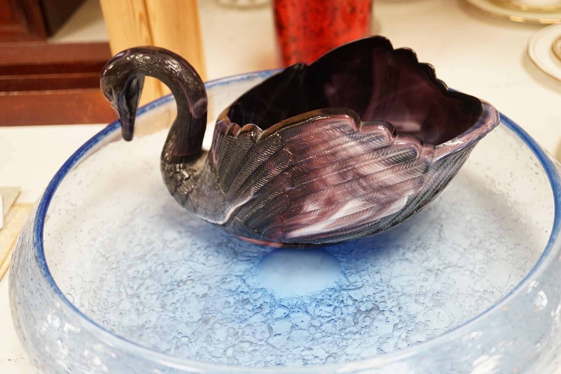 A Sowerby's type pressed glass swan and other glassware, (6) largest 32cm diameter